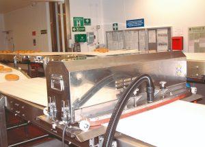 Brush specifically designed for cleaning conveyor belts in food factories